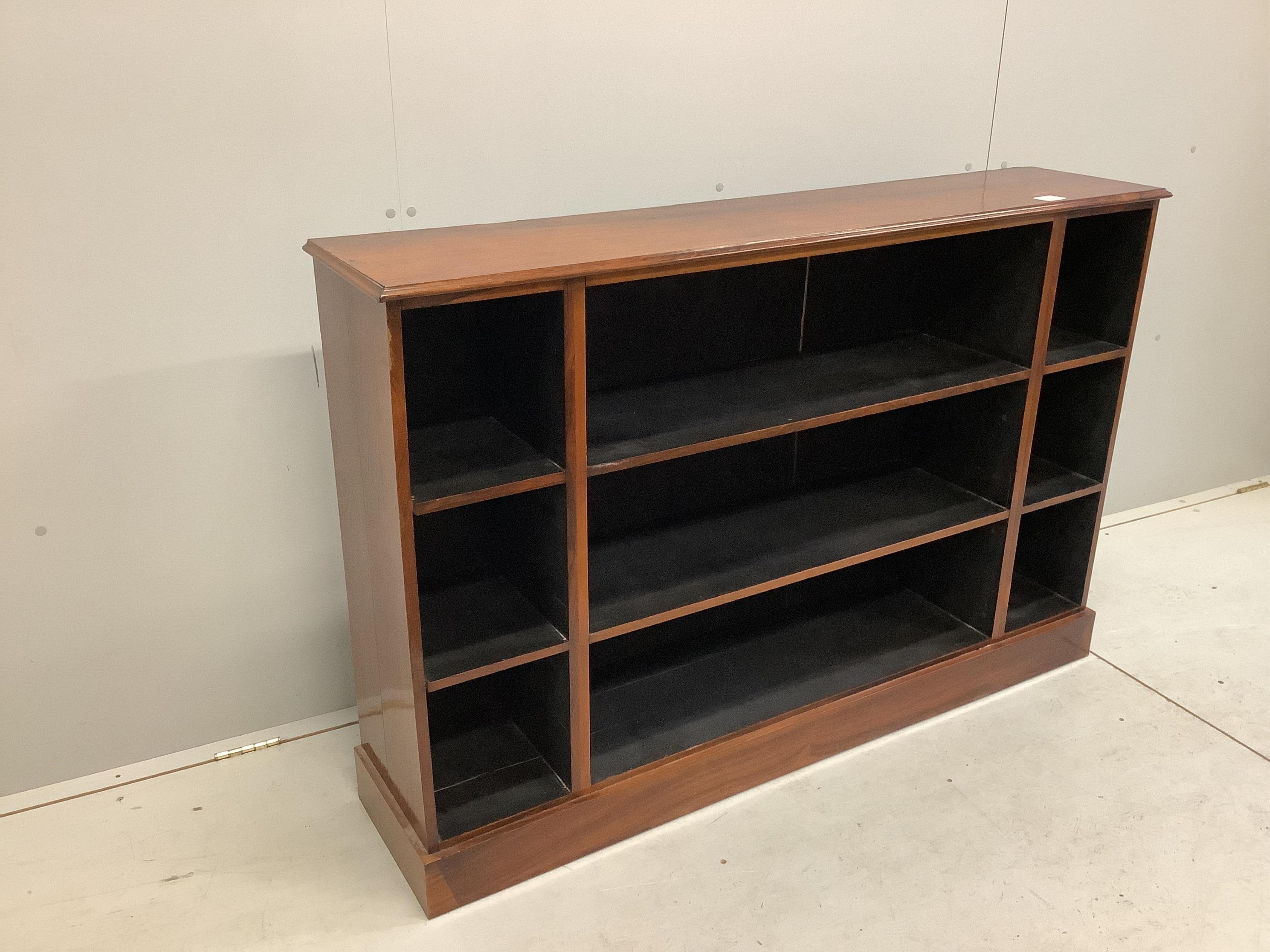 A 19th century and later rosewood open low bookcase, width 138cm, depth 30cm, height 91cm. Condition - fair